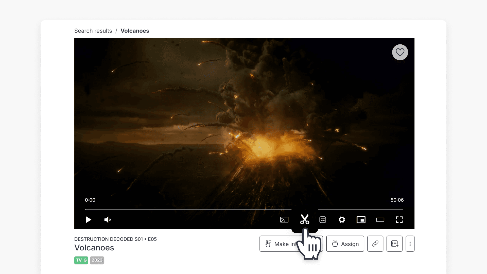 Hand pointing on the 'scissor' icon in the video player