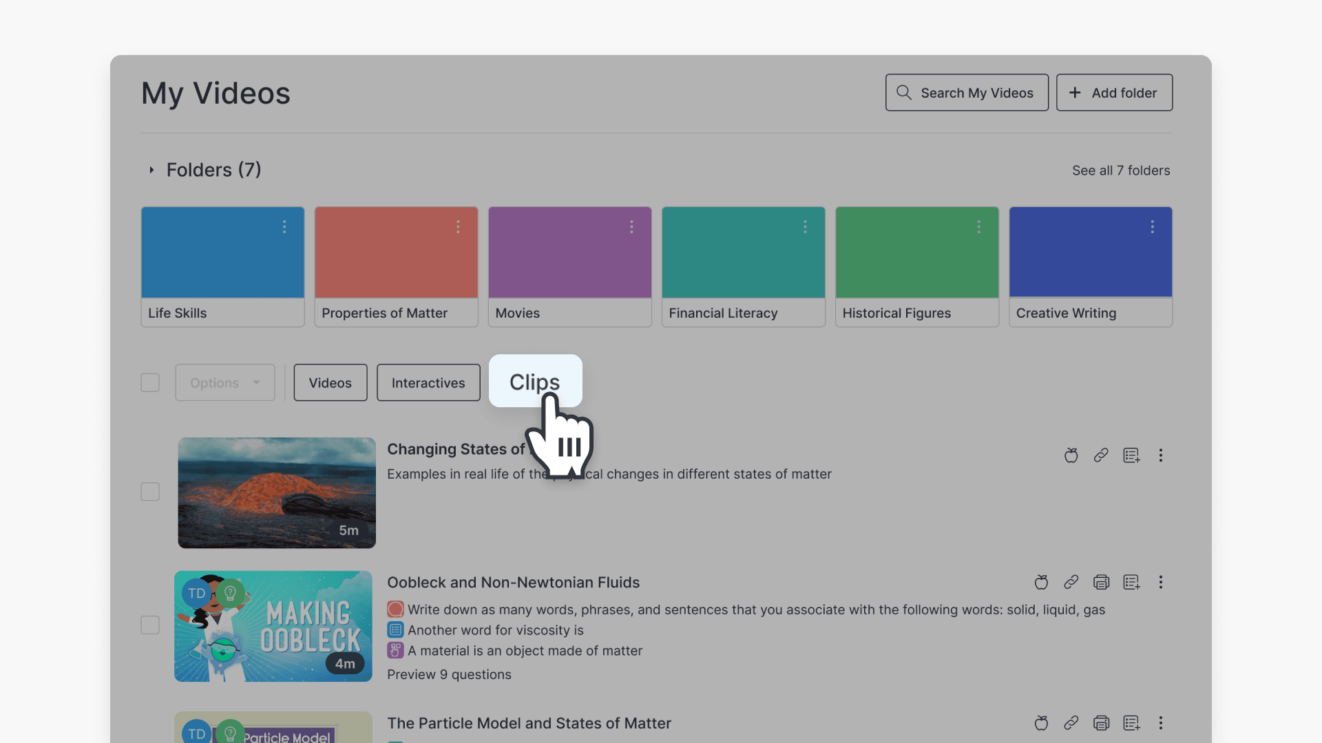 Hand pointing over "Clips" tab in the My Videos page