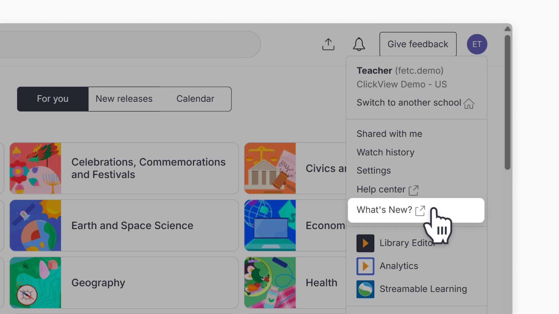 Cursor hovering over the "What's New" option under the account profile