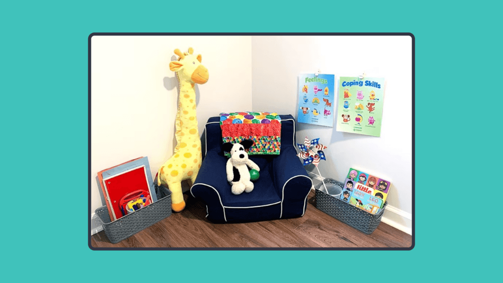 Cozy children's corner with a chair, plush toys, books, and emotion posters on the wall.