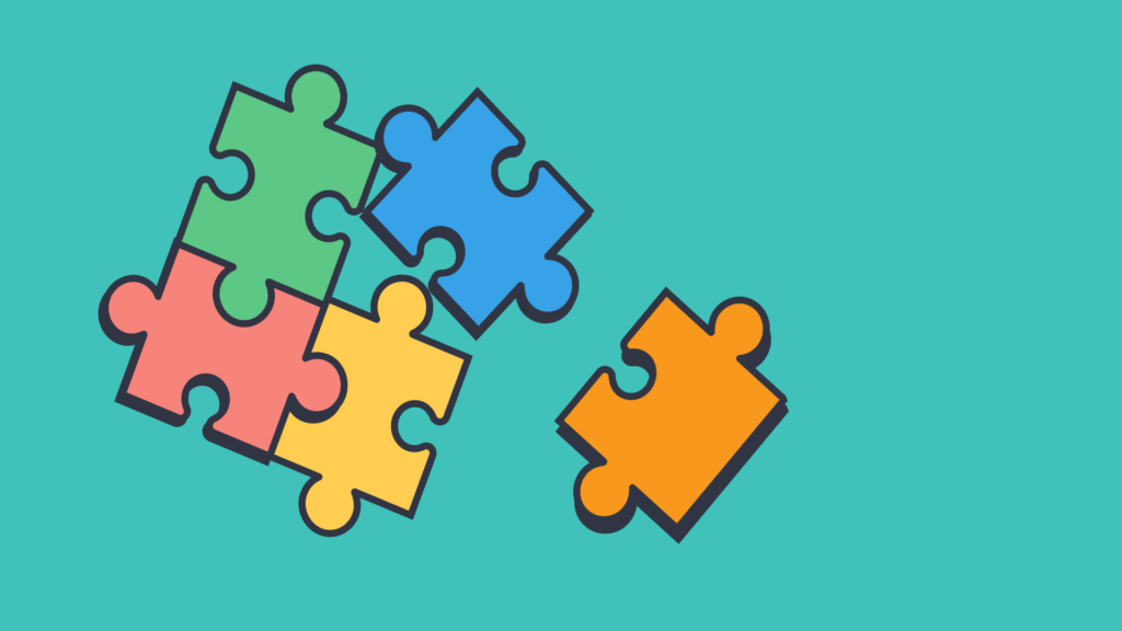 Colorful puzzle pieces symbolizing collaboration and teamwork.