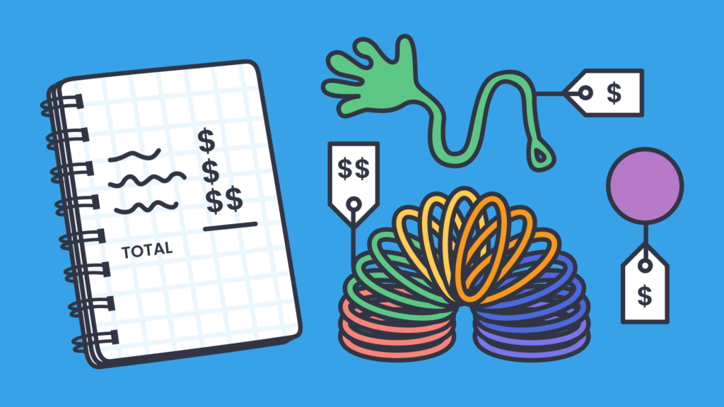 A notebook showing a total cost breakdown beside colorful toys with price tags, representing budgeting for classroom activities or supplies.